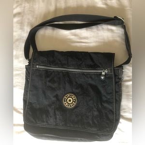 Kipling, expandable messenger bag.